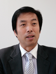 片岡浩一氏(UQコミュニケーションズ 執行役員副社長)