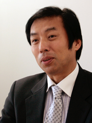 片岡浩一氏(UQコミュニケーションズ 執行役員副社長)