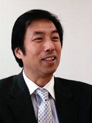 片岡浩一氏(UQコミュニケーションズ 執行役員副社長)