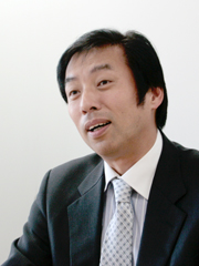 片岡浩一氏(UQコミュニケーションズ執行役員副社長)